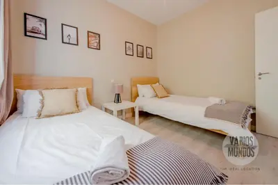 Cama o camas de una habitación en Vive un Oasis para 7 en Santa Ana 6