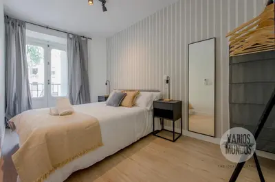 Cama o camas de una habitación en Tradición para 7 desde Tirso de Molina E1