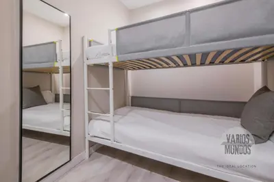 Cama o camas de una habitación en Comodidad y estilo para 9 en Calle de Luciente E2