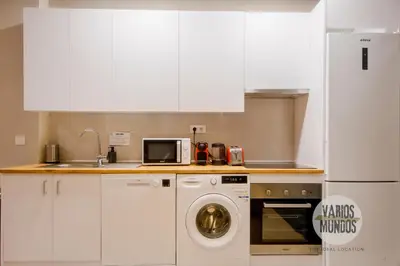 Una cocina o zona de cocina en Rumbo a la comodidad para 9 en Calle del Barco E2