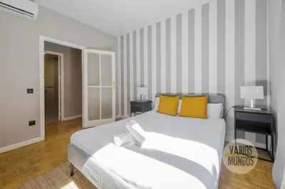 Cama o camas de una habitación en Amplio y Centrico Apt para 9pax en La Latina