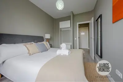 Cama o camas de una habitación en Espaciosa y elegante para 9, conoce Toledo 77