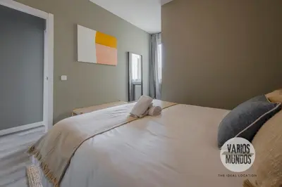 Cama o camas de una habitación en Espaciosa y elegante para 9, conoce Toledo 77