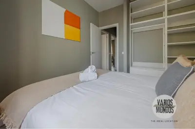 Cama o camas de una habitación en Espaciosa y elegante para 9, conoce Toledo 77