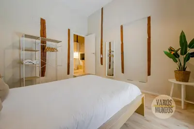 Cama o camas de una habitación en Centrico Apt 7pax en Anton Martin-Centro E2