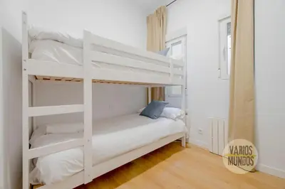 Cama o camas de una habitación en Acogedor Apt para 5pax en el corazon de Chamberi