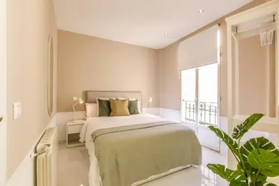 Cama o camas de una habitación en Apartamento Embajadores XIX