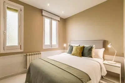 Cama o camas de una habitación en Apartamento Embajadores XIX
