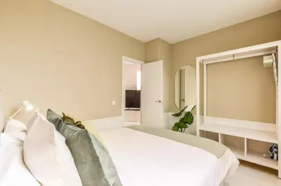 Cama o camas de una habitación en Apartamento Embajadores XIX