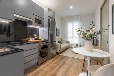 Una cocina o zona de cocina en 2 single beds in Chamberi