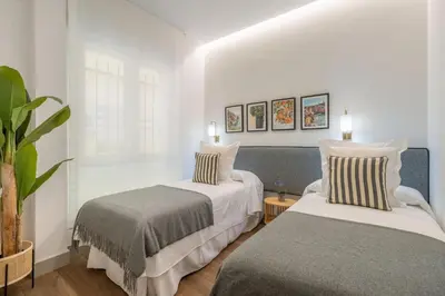 Cama o camas de una habitación en 2 single beds in Chamberi