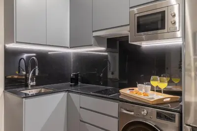 Una cocina o zona de cocina en 2 single beds in Chamberi