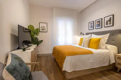 Cama o camas de una habitación en Charming Studio in Chamberí Madrid