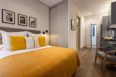 Cama o camas de una habitación en Charming Studio in Chamberí Madrid