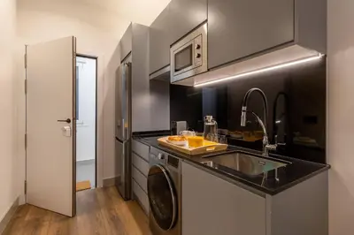 Una cocina o zona de cocina en Charming Studio in Chamberí Madrid