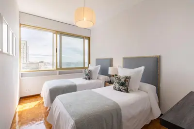 Cama o camas de una habitación en Vibrant 2-Bed Apartment for 4 in Madrid
