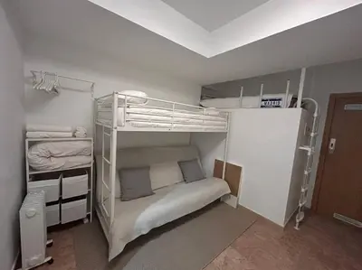 Cama o camas de una habitación en Cute studio in Gran Via -Si1