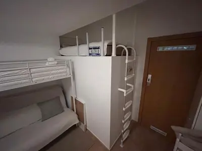 Cama o camas de una habitación en Cute studio in Gran Via -Si1