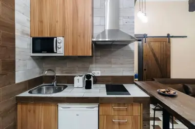 Una cocina o zona de cocina en Cozy apartment in Chueca. Barb1