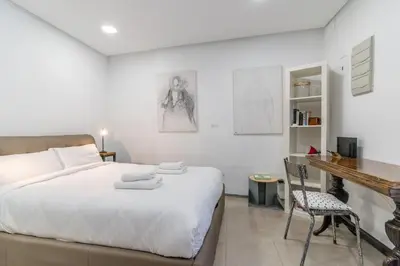 Cama o camas de una habitación en El Atelier loft - Plaza Mayor
