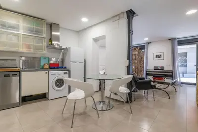 Una cocina o zona de cocina en El Atelier loft - Plaza Mayor