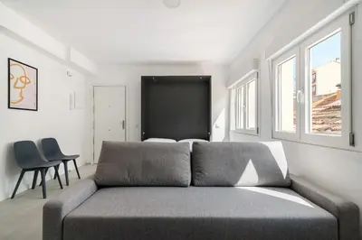 Zona de estar de apartamentos reformados en madrid rio con parking