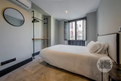 Cama o camas de una habitación en Vista a Madrid para 7 en Santa Ana 20 E2