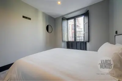 Cama o camas de una habitación en Vista a Madrid para 7 en Santa Ana 20 E2
