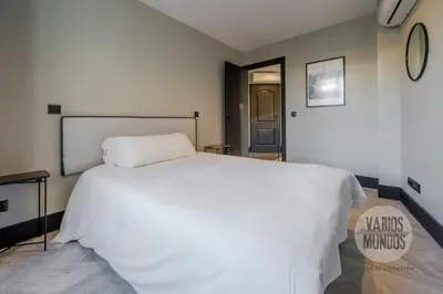 Cama o camas de una habitación en Vista a Madrid para 7 en Santa Ana 20 E2