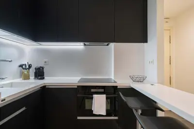 Una cocina o zona de cocina en Housing Gran Via by SharingCo