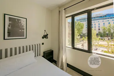 Cama o camas de una habitación en Bright Apt para 4pax en Gran Via-Plaza de Carmen E2