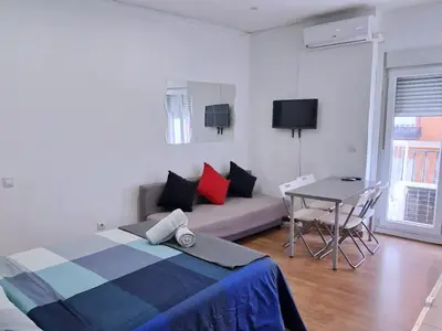 Cama o camas de una habitación en Apartamentos EconoStay Chueca