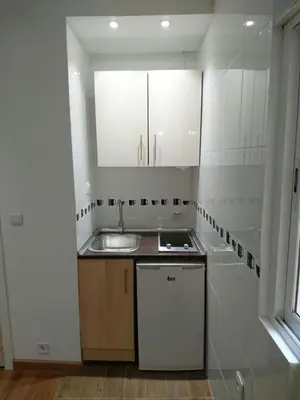 Una cocina o zona de cocina en Apartamentos EconoStay Chueca