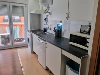 Una cocina o zona de cocina en Apartamentos EconoStay Chueca
