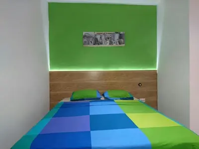 Cama o camas de una habitación en Apartamentos EconoStay Chueca