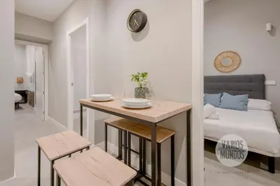 Cama o camas de una habitación en Las Letras a tus pies para 7 en San Pedro 26 GL