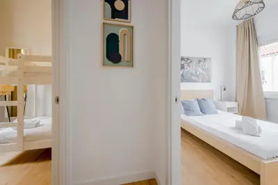 Cama o camas de una habitación en Aventura y tradición en La Latina, conoce Toledo 77