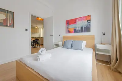 Cama o camas de una habitación en Aventura y tradición en La Latina, conoce Toledo 77