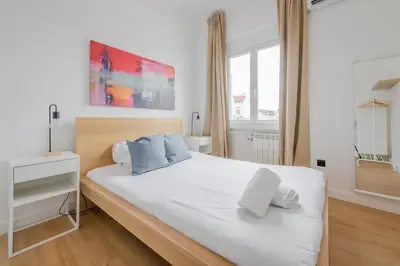 Cama o camas de una habitación en Aventura y tradición en La Latina, conoce Toledo 77