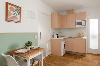 Una cocina o zona de cocina en Sol Studios - En el Centro