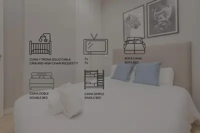 Cama o camas de una habitación en Acogedor Apt 3 habitaciones y terraza en el Centro de Madrid