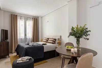 Cama o camas de una habitación en Waou Gran Via Studio I - Corta Duración