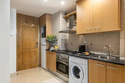 Una cocina o zona de cocina en Waou Gran Via Studio I - Corta Duración