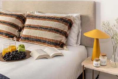 Cama o camas de una habitación en Waou Gran Via Studio I - Corta Duración