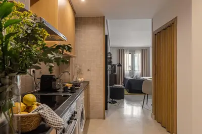 Una cocina o zona de cocina en Waou Gran Via Studio III - Corta Duración