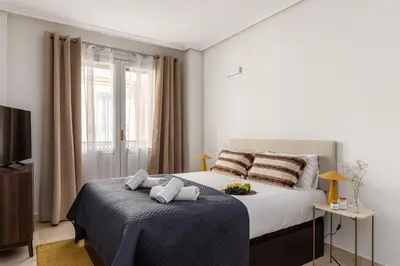 Cama o camas de una habitación en Waou Gran Via Studio III - Corta Duración