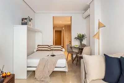 Cama o camas de una habitación en Waou Gran Via Apartment II - Corta Duración