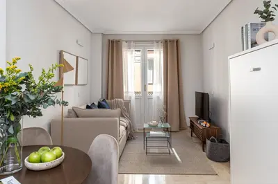 Zona de estar de Waou Gran Via Apartment IV - Corta Duración
