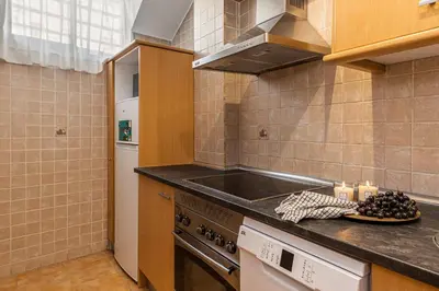 Una cocina o zona de cocina en Waou Gran Via Attic - Corta Duración