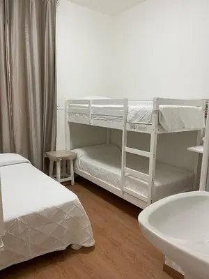 Cama o camas de una habitación en Pensión DANIEL